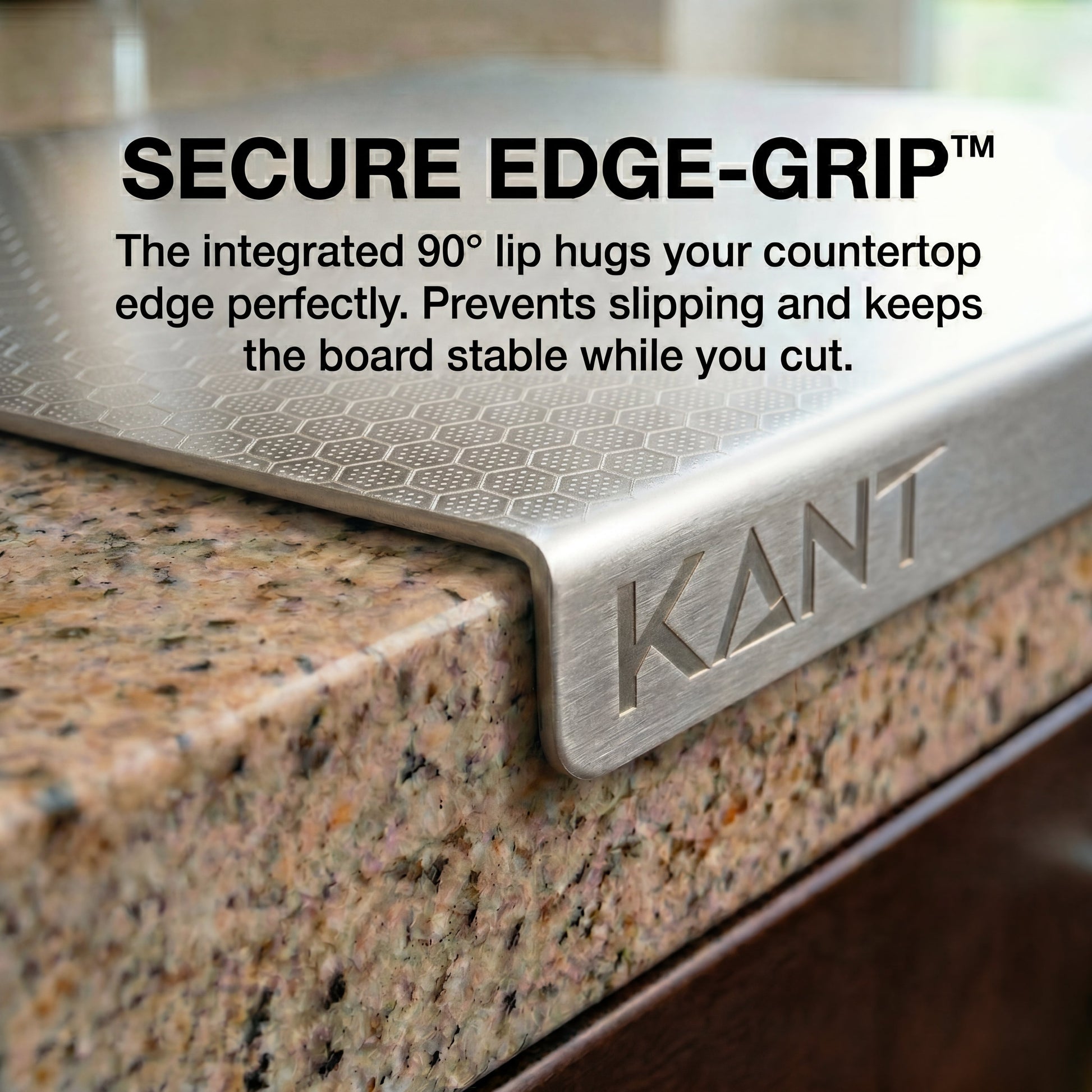 Stainless steel kitchen cutting board on counter